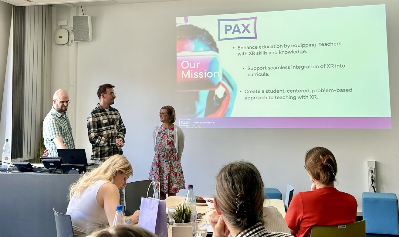 From Athens to Bamberg: PAX at the International Symposium on VR- and AI-Assisted Foreign Language Learning